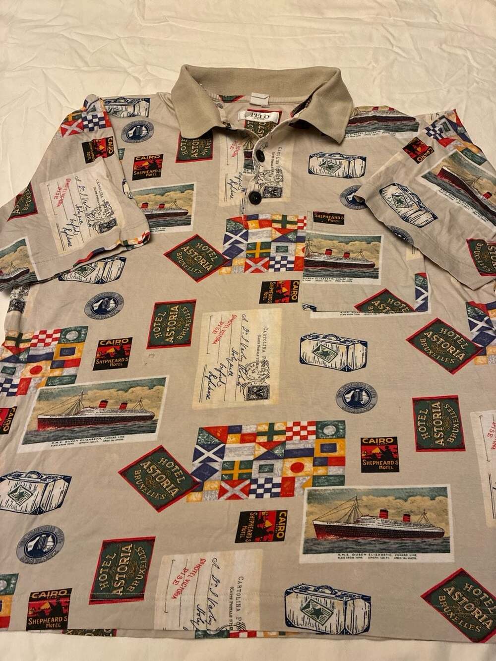 VTG PELO Travel Theme All Over Print Polo Shirt - RMS Queen Elizabeth Hotel Asto